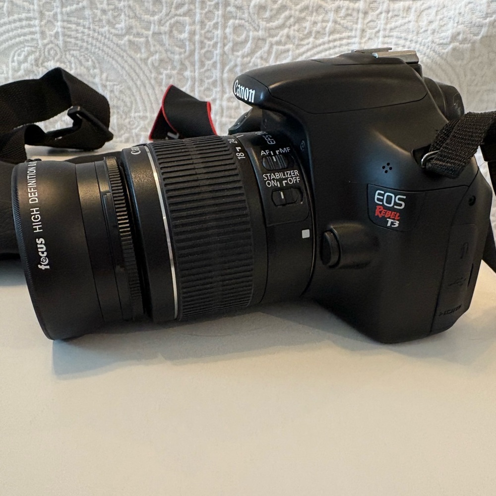 EOS REBEL T3 1100D Cannon Camera with so many accessories!